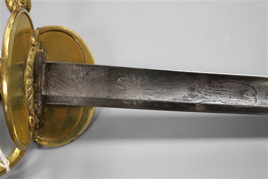 A Georgian infantry officers sword, fine gilt hilt, folding guard, the blade etched GR and Royal Arms, blade 82.5cm, overall length 99